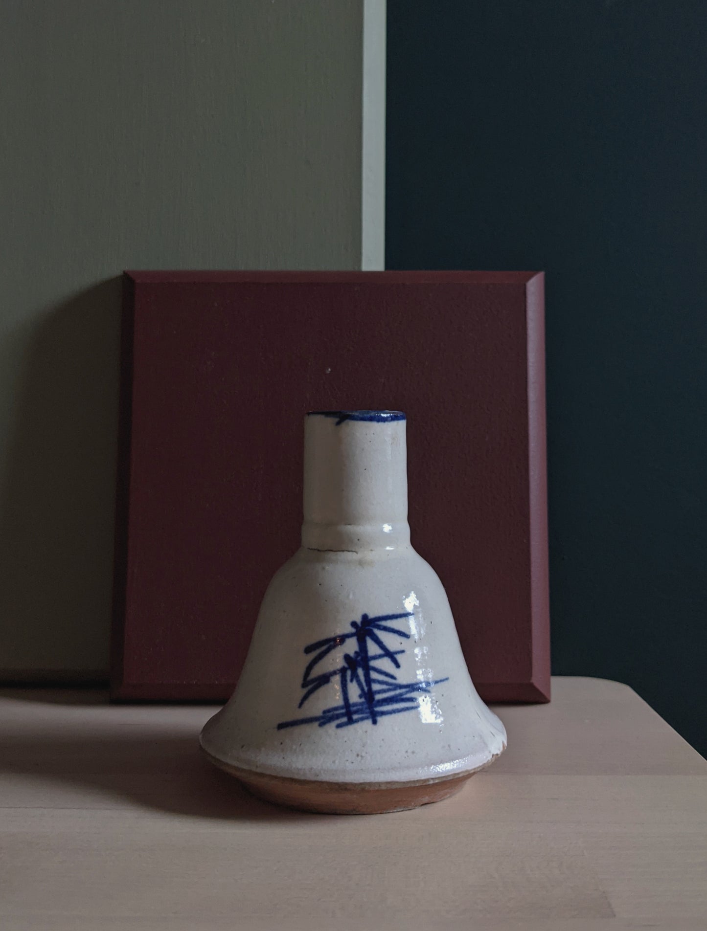 Bell-shaped pottery vase with abstract hand-writhing