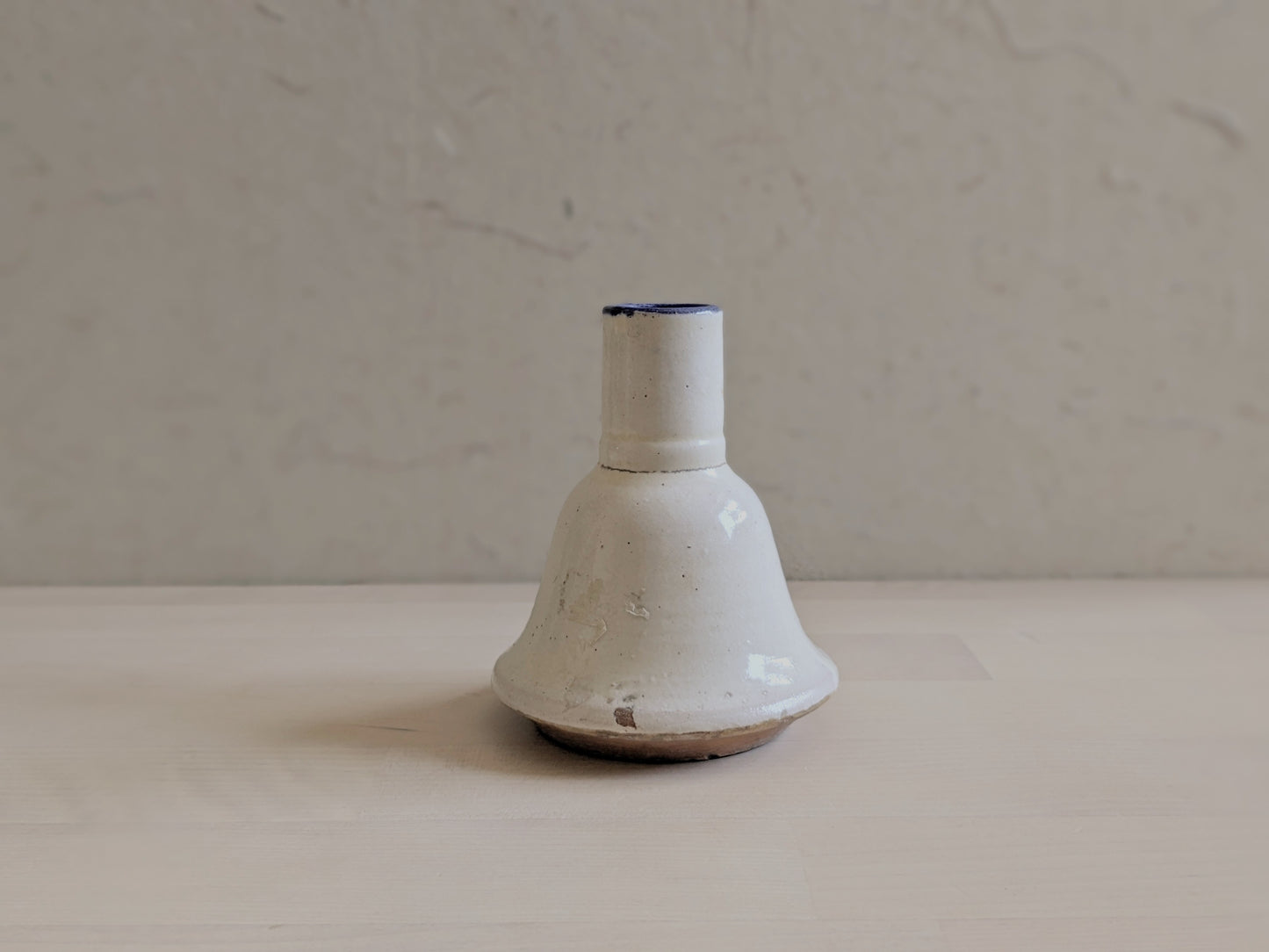 Bell-shaped pottery vase with abstract hand-writhing