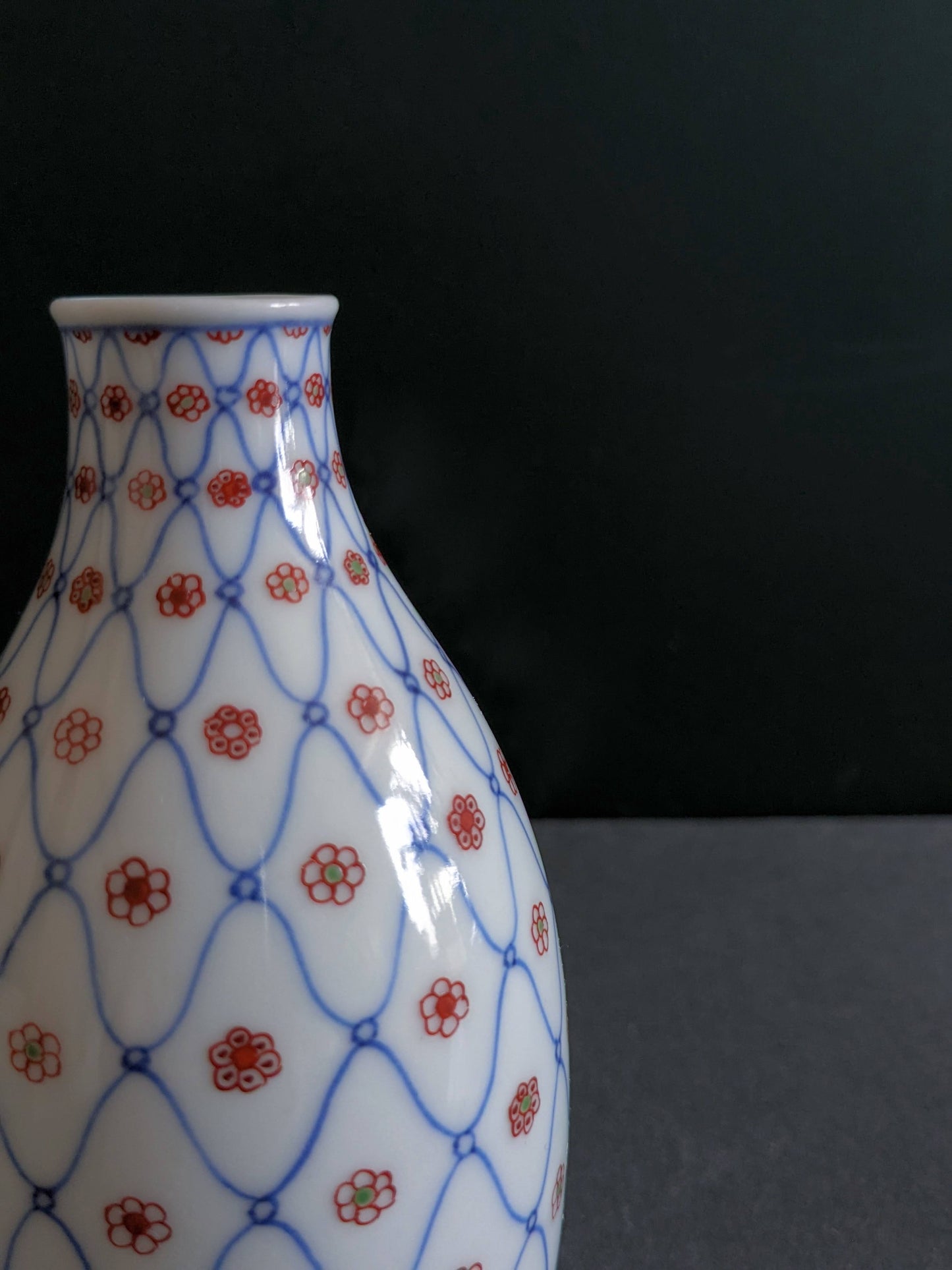 Vintage sake bottle with fishnet and flower pattern